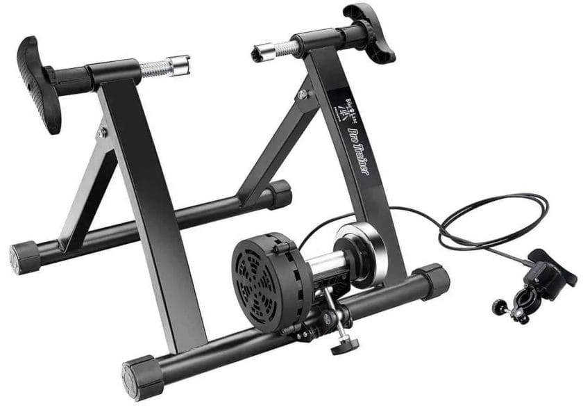 Photo of a black bike lane pro trainer and its accessories. Bike Lane Pro Bike Trainer Review